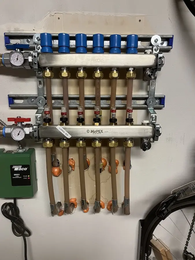 Plumber performing Water Heater Repair at a residential property in Upper Hanover